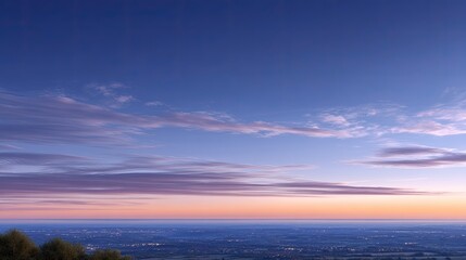 Fototapeta premium Serene Sunset Over Calm Horizon with Colorful Sky and Soft Clouds Reflecting Light in Beautiful Twilight Atmosphere for Landscape Photography