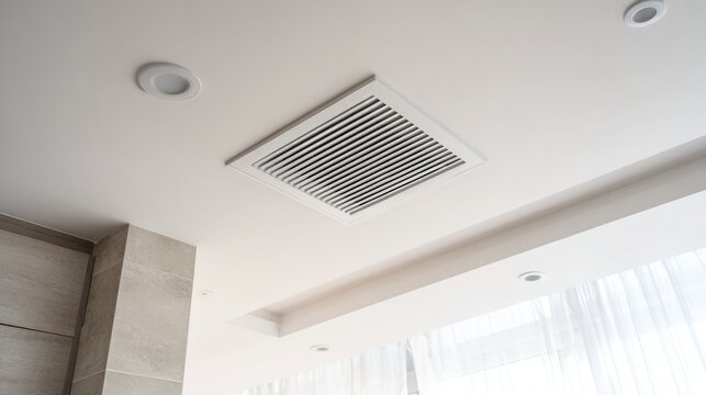 Modern kitchen ceiling with air vent in stylish apartment design