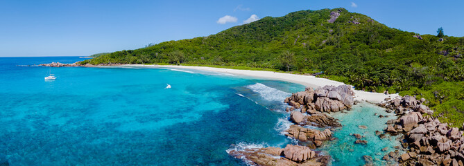 Obraz premium Discover the serene beauty of Anse Cocos beach in La Digue, Seychelles, a tropical paradise