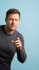 Confused And Skeptical Mature Man Looking At Camera