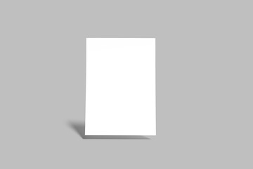 A white vertical paper sheet mockup, A4 A5 A6 flyer mockup, paper, letter, invitation card, on a green background with a shadow overlay.