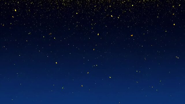 Falling golden glitter particles on blue background.