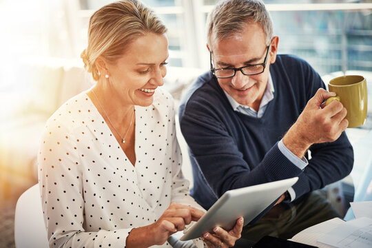 Tablet, home and mature couple with finance app for savings, insurance application and coffee. Technology, happy man and woman with budget, tea or asset management for 401k investment with flare
