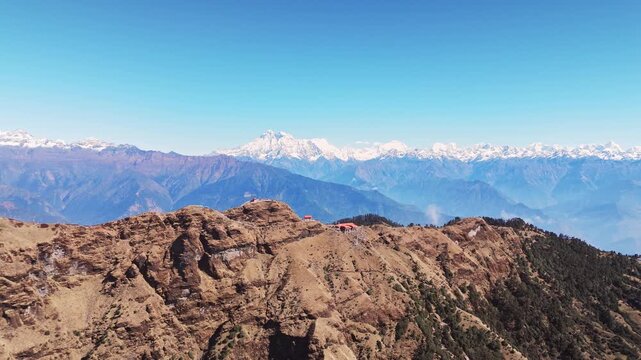 Kalinchowk Bhagawati Temple in Dolakha is set against Himalayan mountains and lush hills offering a stunning aerial perspective in Nepal