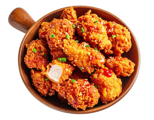 Crispy fried chicken pieces in a wooden bowl with garnish