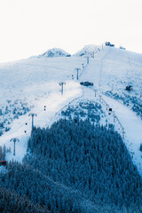 Jasn&aacute; ski resort in the Low Tatras Mountains, located in the Liptov region of Slovakia. Snow-covered peaks, alpine slopes, and winter landscape create a popular destination for skiing
