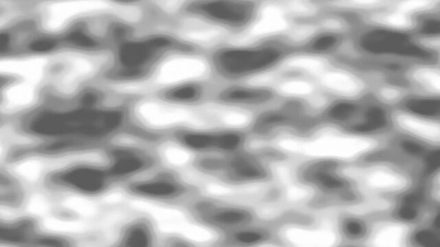 Abstract grayscale pattern with varied shapes and textures across the image