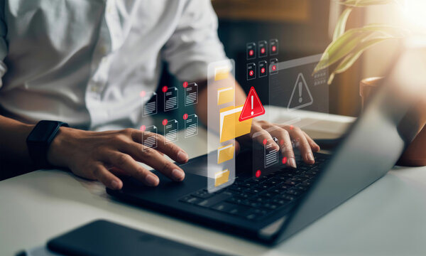Cybersecurity file breach concept with digital document and folder warning alert, error, malware attack, data corruption and information loss through system vulnerability on screen.