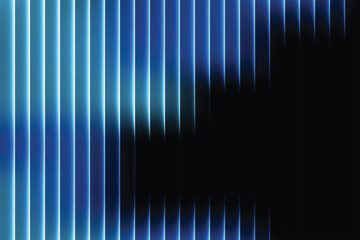 Abstract blue and cyan vertical lines fading into black background