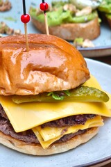 Close up of delicious burger on plate.