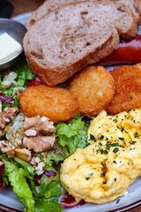 close up of delicious breakfast on a plate in restaurant