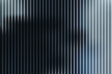 Obraz premium Vertical blinds with gradient light and shadow effect window covering