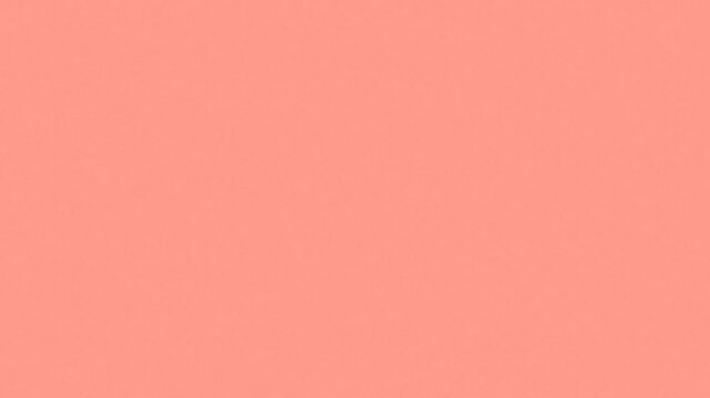 A smooth gradient background transitioning from light pink to coral orange