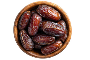 Dried dates in a wooden bowl