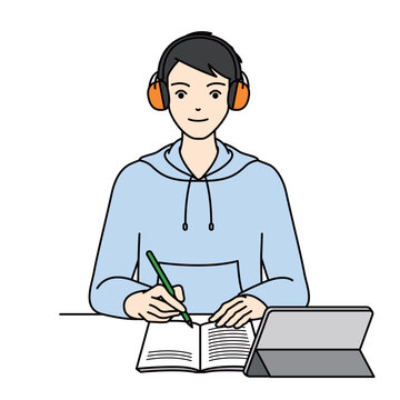 High school boy studying with earmuffs for sensory processing