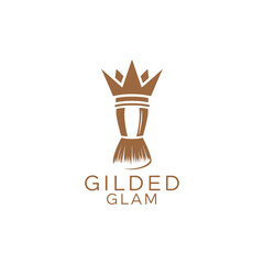 Obraz premium Elegant makeup brush with royal crown icon logo for professional beauty artist and luxury salon branding named Gilded Glam