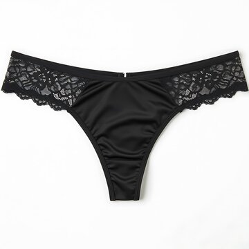 Black lace trim thong underwear with floral lace detailing shown flat