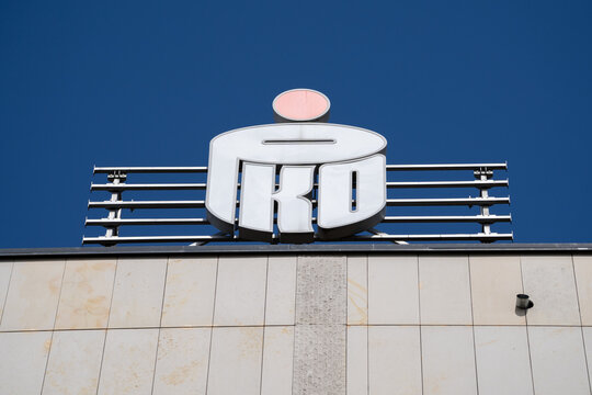 PKO Bank Polski S.A. logo sign. Powszechna Kasa Oszczędności PKO BP. Polish retail banking company. Signboard with brand logotype hanging at branch office building on March 24, 2025 in Krakow, Poland.