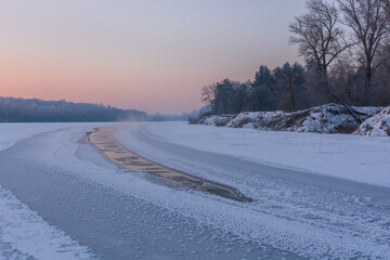 Fototapeta premium river in winter with frost
