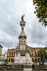 Paseo de Pablo Sarasate Pasalekua with Monumento a los Fueros at its end in Pamplona, Spain