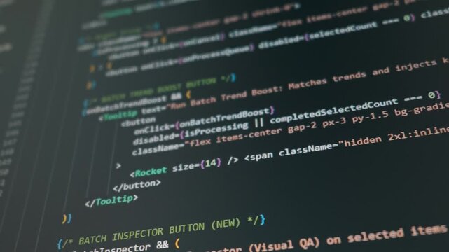 Computer monitor displays scrolling React source code on a sleek dark interface. Concept of vibe coding, modern AI app development, and efficient software engineering.