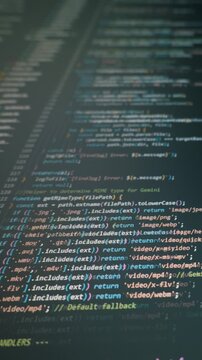 Colorful programming commands scrolling on a dark digital interface. Vertical close-up. Concept of vibe coding, AI driven software development, and modern tech workflow.