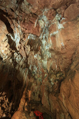 Geological formation with limestone deposits. Mystical atmosphere and subterranean tourism adventure.