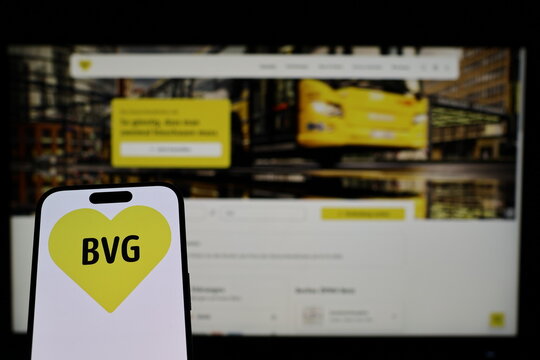 Kiel, Germany - 02-04-2026: Smartphone displaying German public transport company BVG logo in front of companys webpage