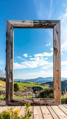Weathered Wooden Frame Overlooking Rolling Hills Under Blue Sky and Clouds