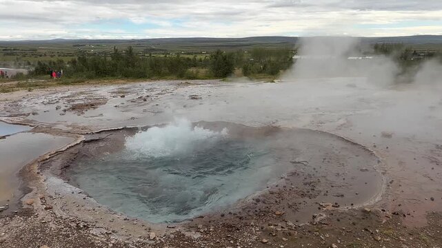 Bubbling hot spring seen at the Geysir geothermal area in Iceland