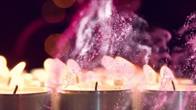 Center tealight flickering, sparking smoke plume rising, curling, fading with pink ribbons for mood