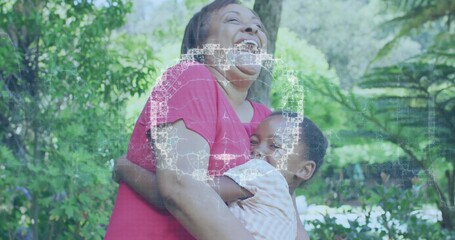 Laughing mom in pink top holding daughter in pastel striped shirt in garden, schematic overlay