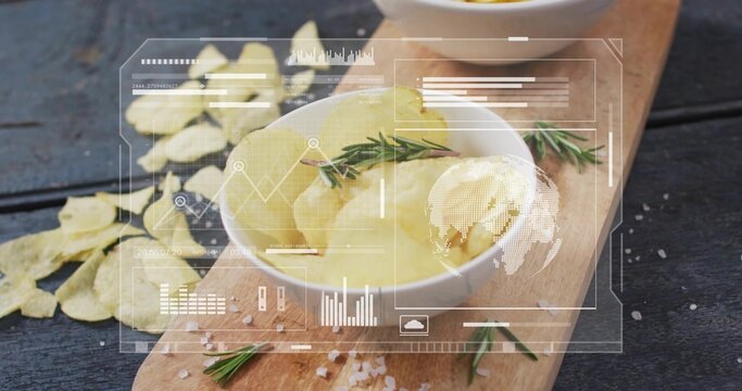 Displaying white ceramic bowl holding pale yellow potato scoops on cutting board with chips and HUD