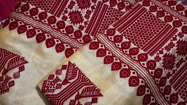 Shot of Traditional Assamese Toss muga Mekhela Chador  of Assamese, Toss Muga sador mekhela is a premium and traditional attire of Assamese culture, worn mainly by women during the Bihu dance ..