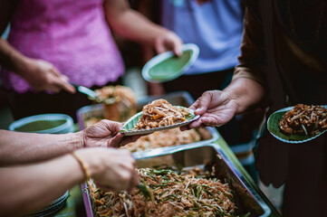 volunteers give food to local poor people, Feeding the poor Help them relieve hunger