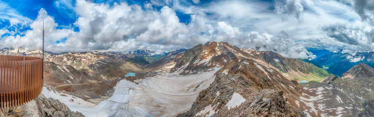 Schnalstal Glacier melting under dramatic sky in Italian Alps