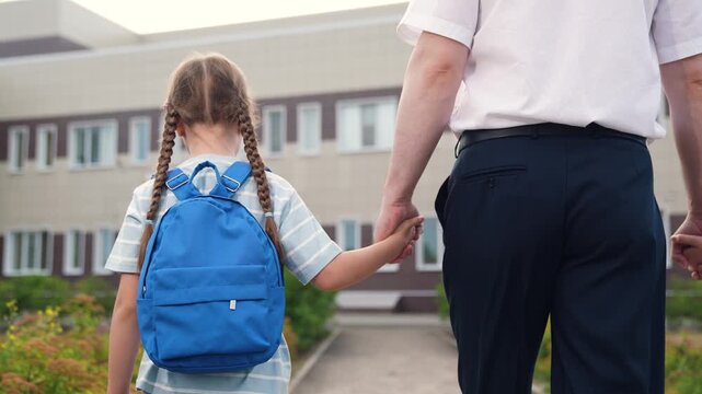 child hold father hand go to school, child with school backpacks parent go to class, adult holds child hand, happy family, education kid girls daughters, father parent man sees daughters class