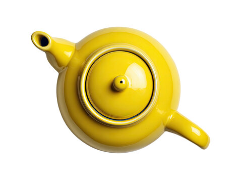 Overhead view of a vibrant yellow teapot on a black background, with the spout and handle visible