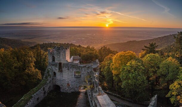 Sunrise over the Alsace plain from Bernstein castle ruins, France