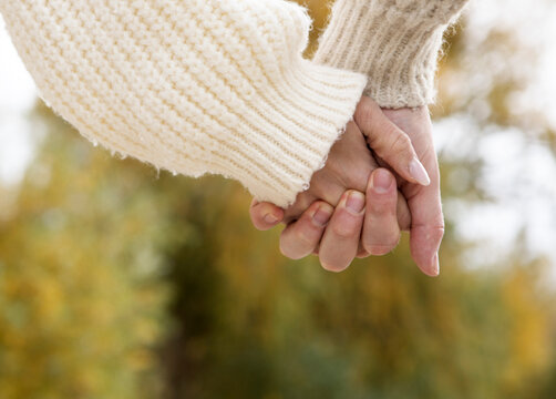 Love story. Couple in love. Honeymoon. Couple love. Lifestyle. Man and woman park. Hands. Dream. Dating. Autumn time. 