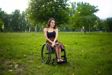 Person Sitting in Wheelchair on Grassy Field