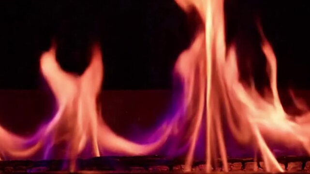 Cauldron of Light An empty, antique-style metal cauldron, seen from a slightly elevated angle. Inside, tritone firelight pulses and glows, illuminated dramatically by a side light that highlights the