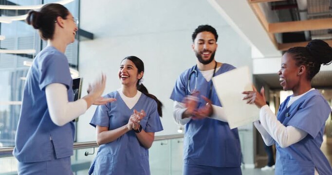 Applause, hand stack and healthcare with team of people in hospital for motivation or support. Clapping, huddle or medical success with doctors and nurses in hallway of clinic for collaboration