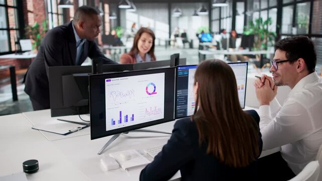 Diverse Group Of Analysts Looking