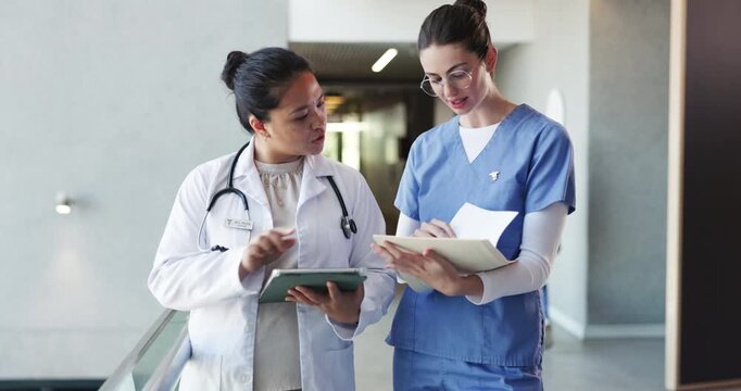 Nurse, discussion and folder with doctor in hospital for treatment plan, consulting or medical report. Brainstorming, healthcare diagnosis and advice with people in clinic for meeting and feedback