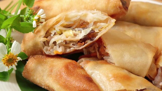 Fried spring rolls are a popular dish on the dinner table.