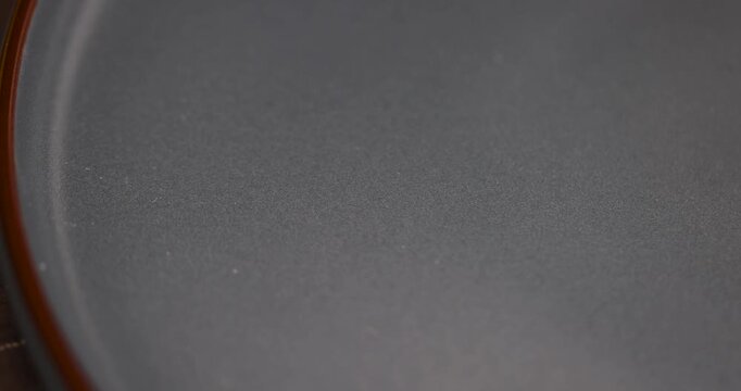 blue ceramic bowl made of baked clay and painted blue, beautifully evenly colored blue ceramic bowl for eating and serving dishes