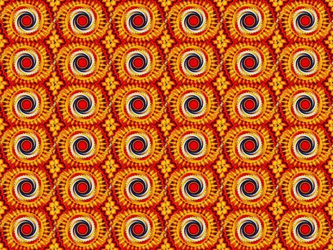 a bright orange pattern of many identical elements rotating in a spiral