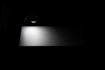 spotlight on blank white presentation screen or projector screen for mockup, isolated on black background, png
