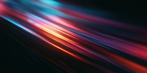 Streaks of vibrant red, orange, and blue light blur across a dark background